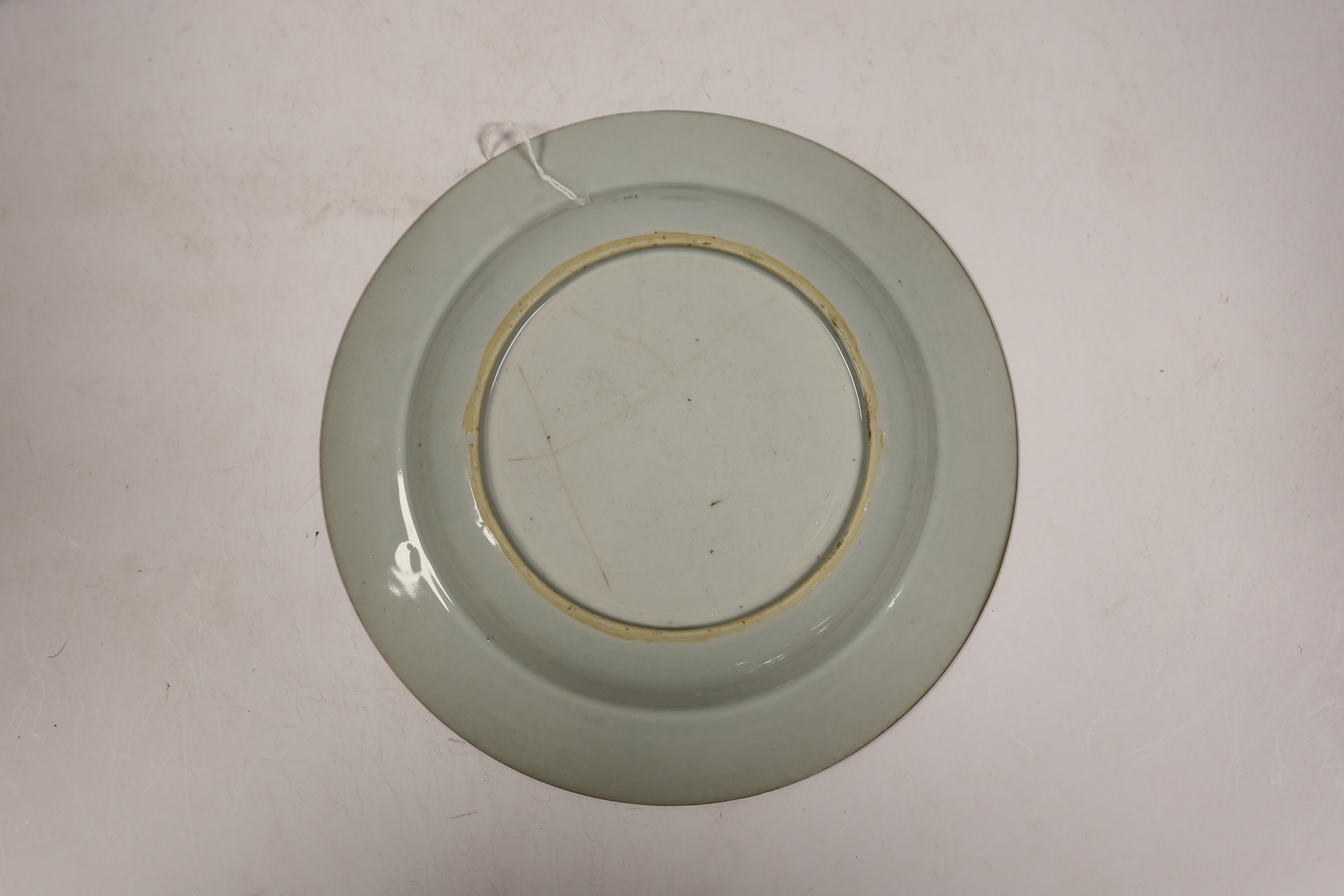 A Chinese bianco sopra bianco plate, diameter 23cm, and two blue and white small pots